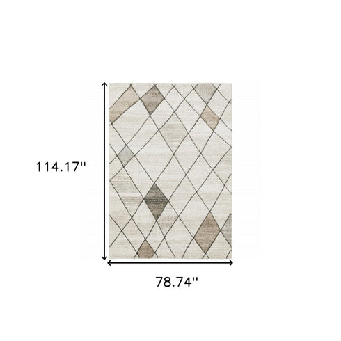 3' X 5' Beige Grey Tan And Brown Geometric Power Loom Stain Resistant Area Rug